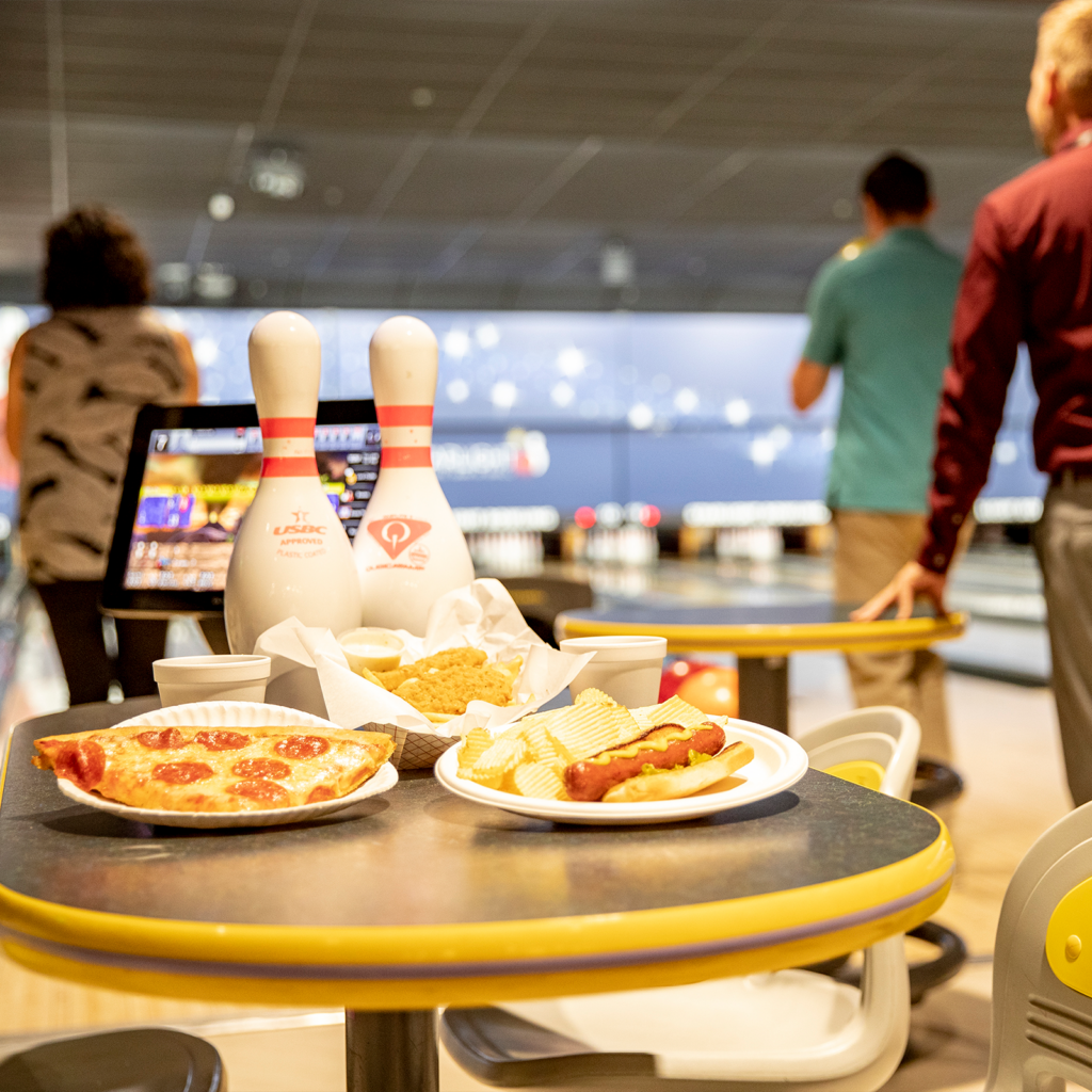 A group of friends bowling