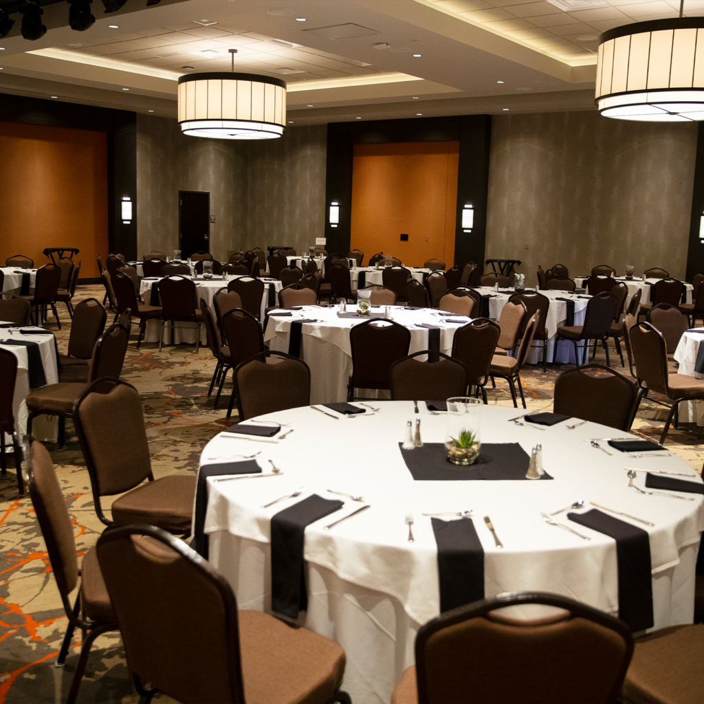 Wide shot of an empty meetings and conferences room set and ready for a group